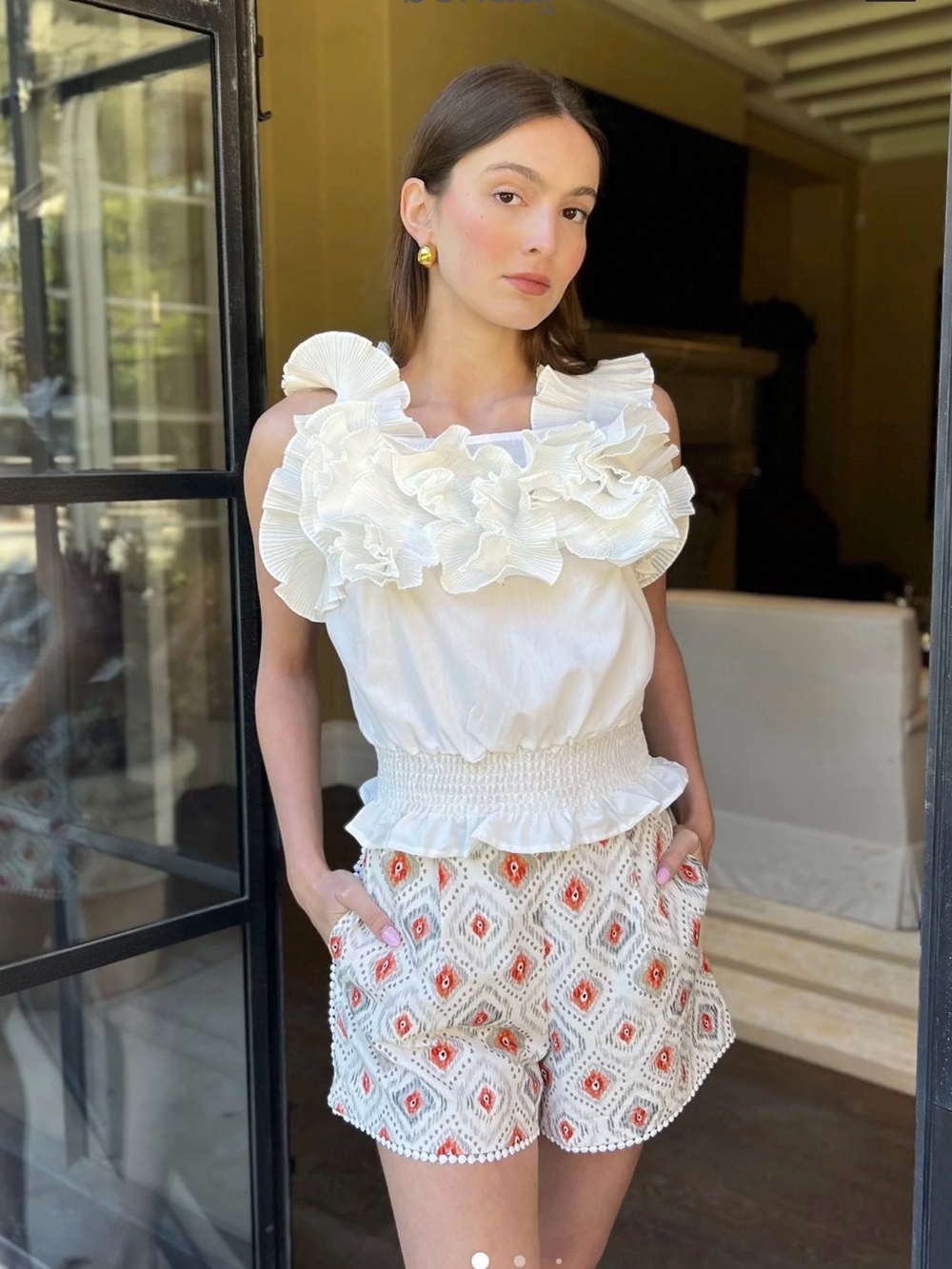 Ruffled White Sleeveless Smocked Waist Top